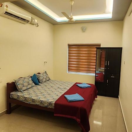 Punerjeni Homes Alappuzha Extérieur photo