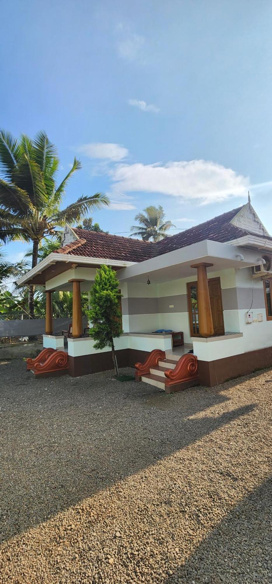 Punerjeni Homes Alappuzha Extérieur photo
