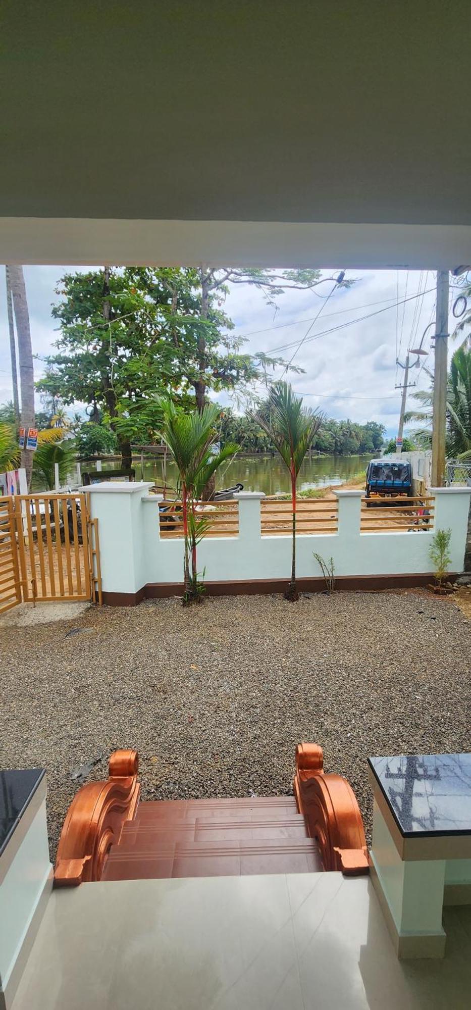 Punerjeni Homes Alappuzha Extérieur photo